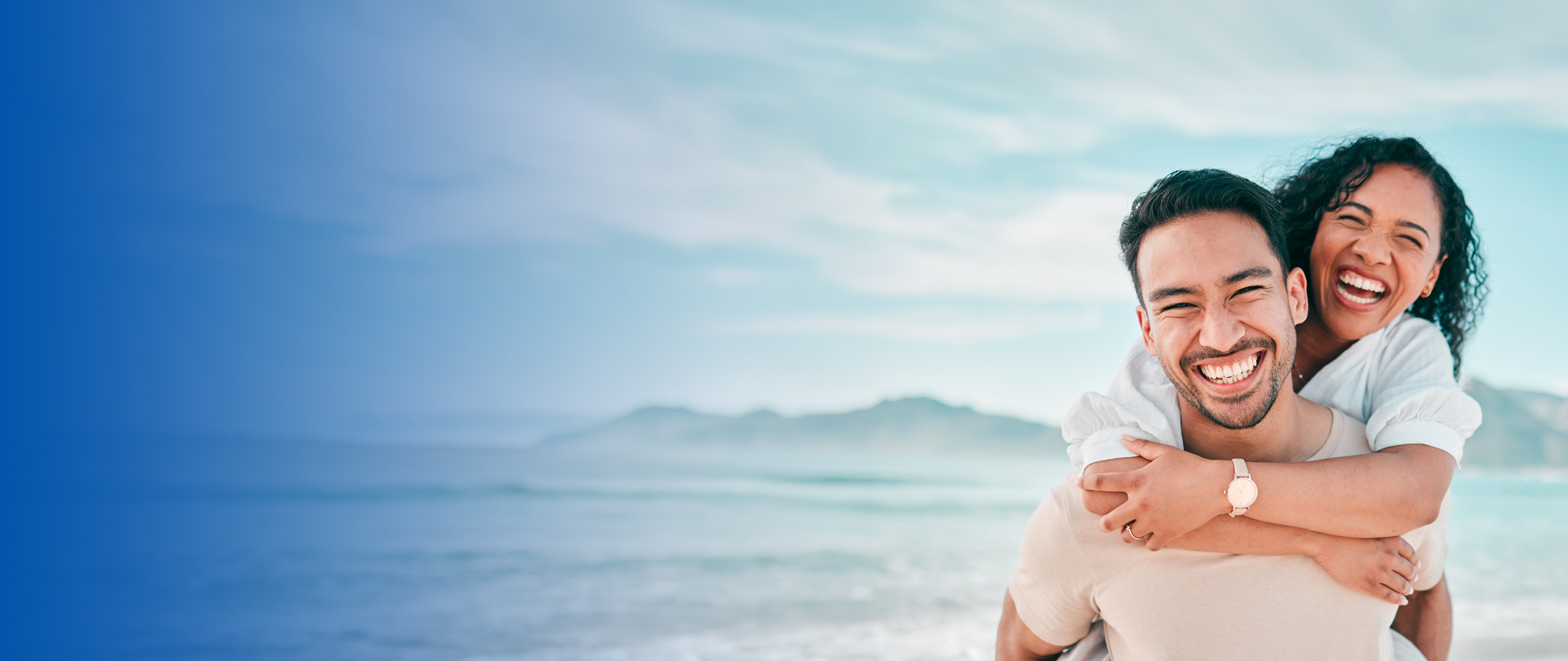 A smiling couple at the beach